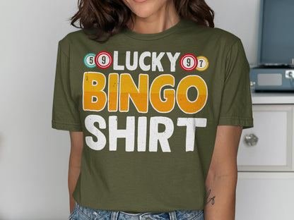Green t-shirt with "Lucky Bingo Shirt" text and bingo numbers.