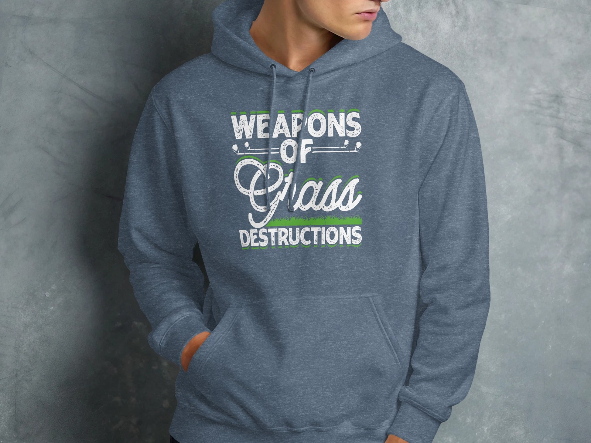 Grey hoodie with "Weapons of Grass Destructions" text and golf clubs.