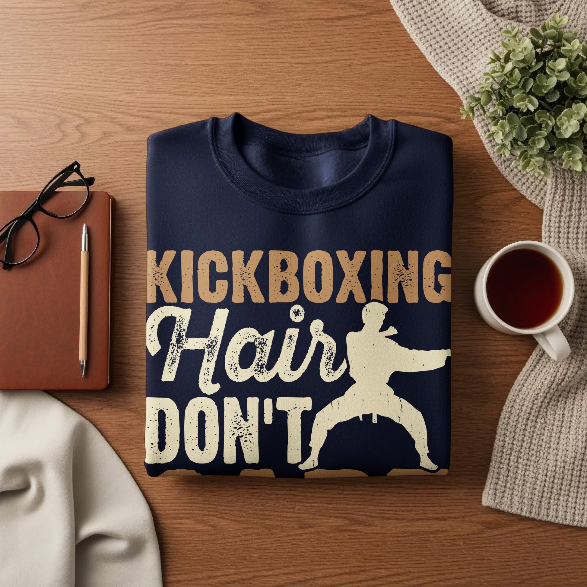 Navy sweatshirt with "Kickboxing Hair Don't Care" text and a silhouetted fighter.