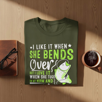 Olive green t-shirt with a graphic of a fish and text about bending and tugging.