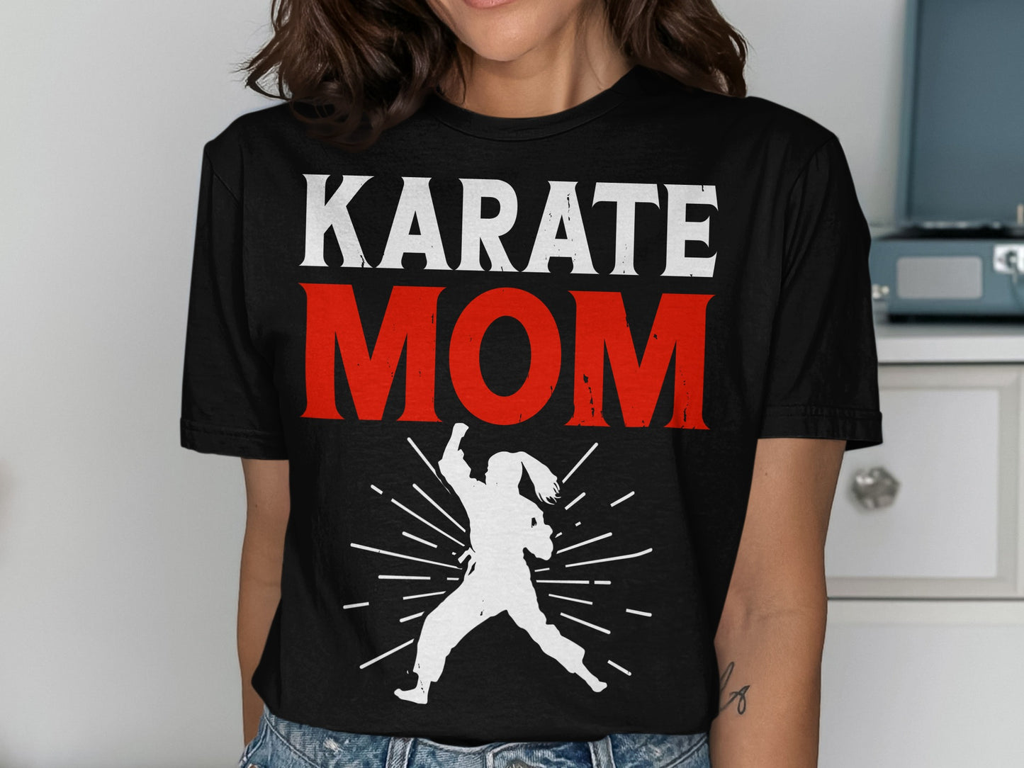 Black t-shirt with white "KARATE" and red "MOM" text above a white silhouette.