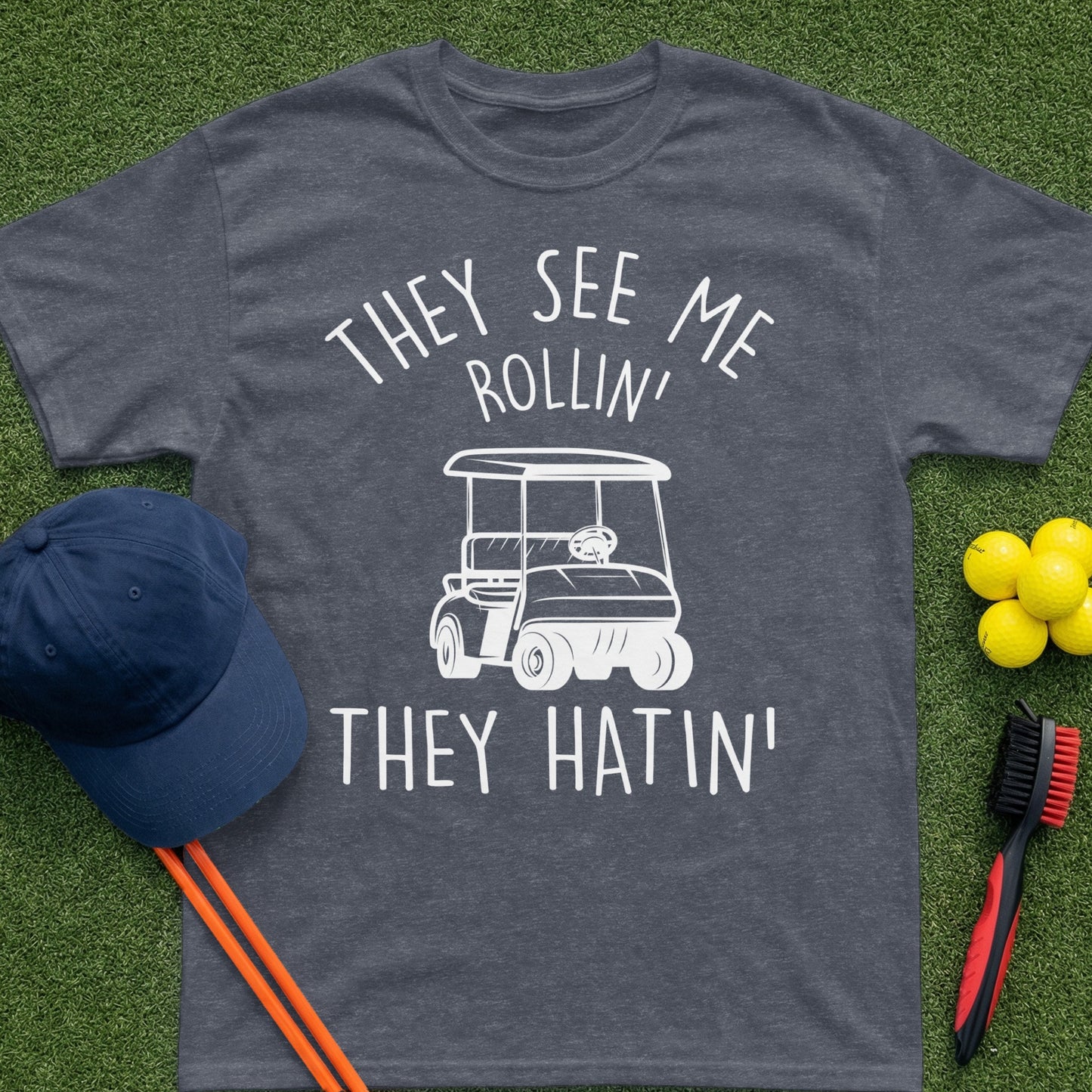 Dark grey t-shirt with white text and a golf cart graphic.