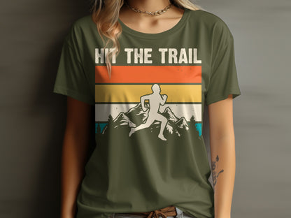 Olive green t-shirt with graphic of runner and mountains, text "HIT THE TRAIL".