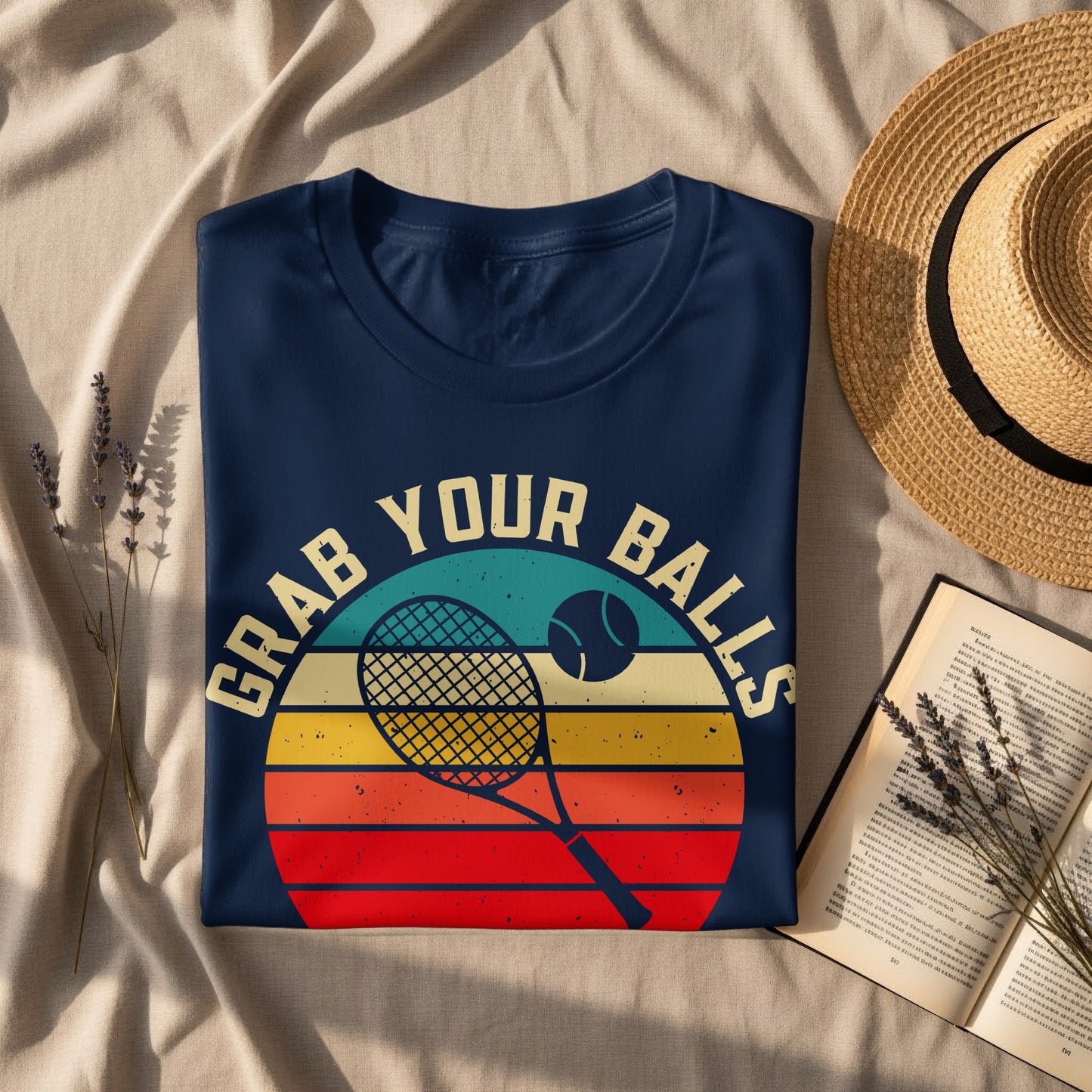Navy t-shirt with vintage tennis graphic: "Grab Your Balls".