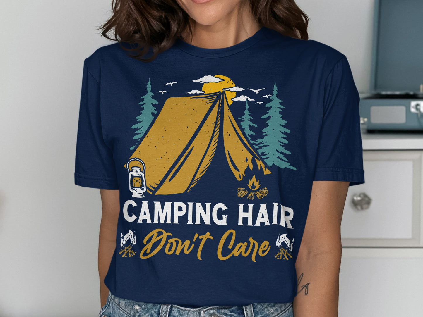 T-shirt with "Camping Hair Don't Care" text and tent graphic.