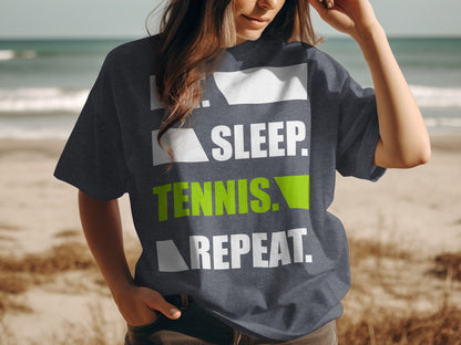 T-shirt with text: Sleep, Tennis, Repeat, on a beach.