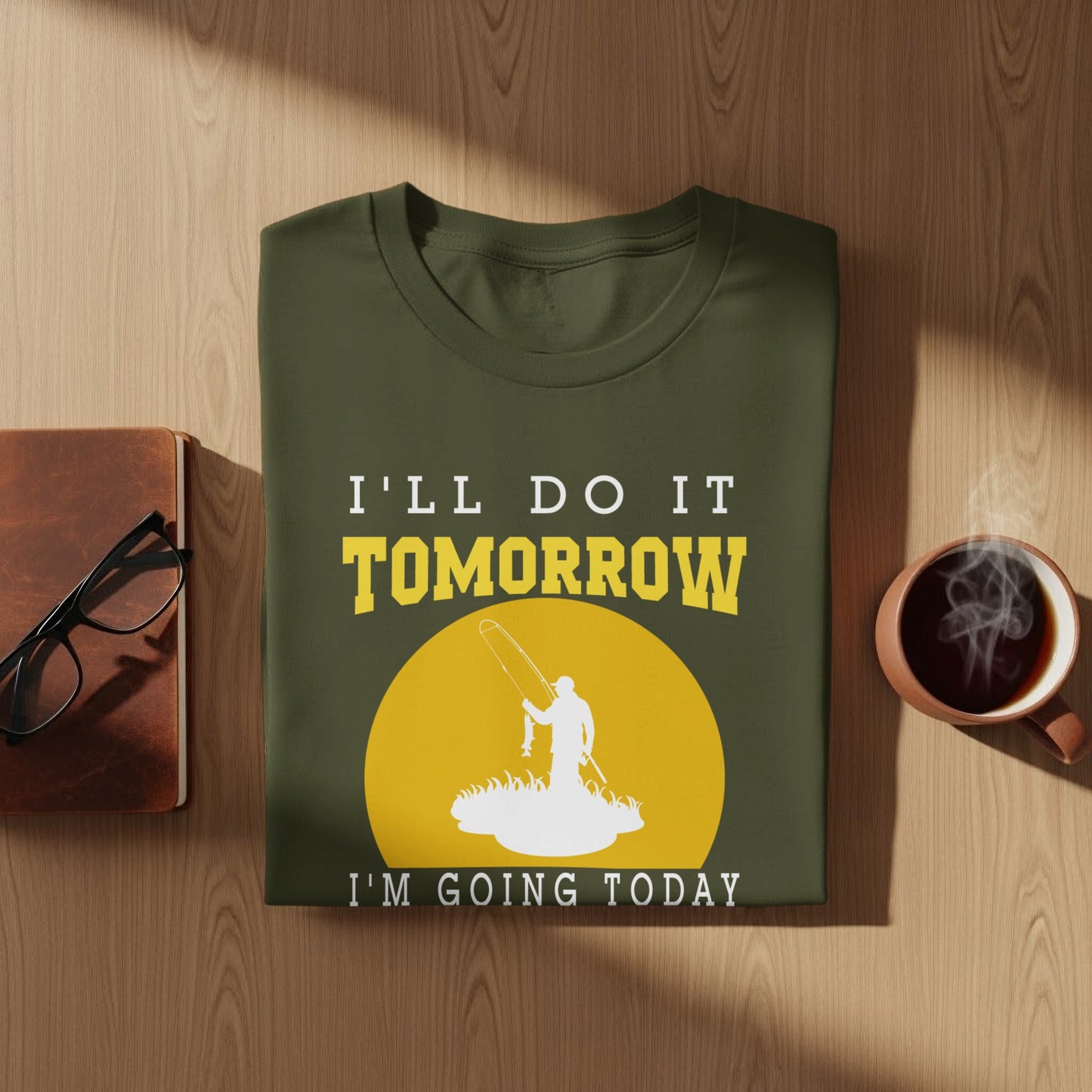 Green t-shirt with yellow text "I'll do it tomorrow, I'm going today" and fishing graphic.