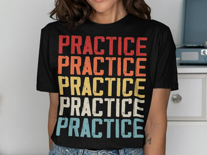 Black t-shirt with "PRACTICE" printed five times in rows of red, orange, yellow, white, and blue.