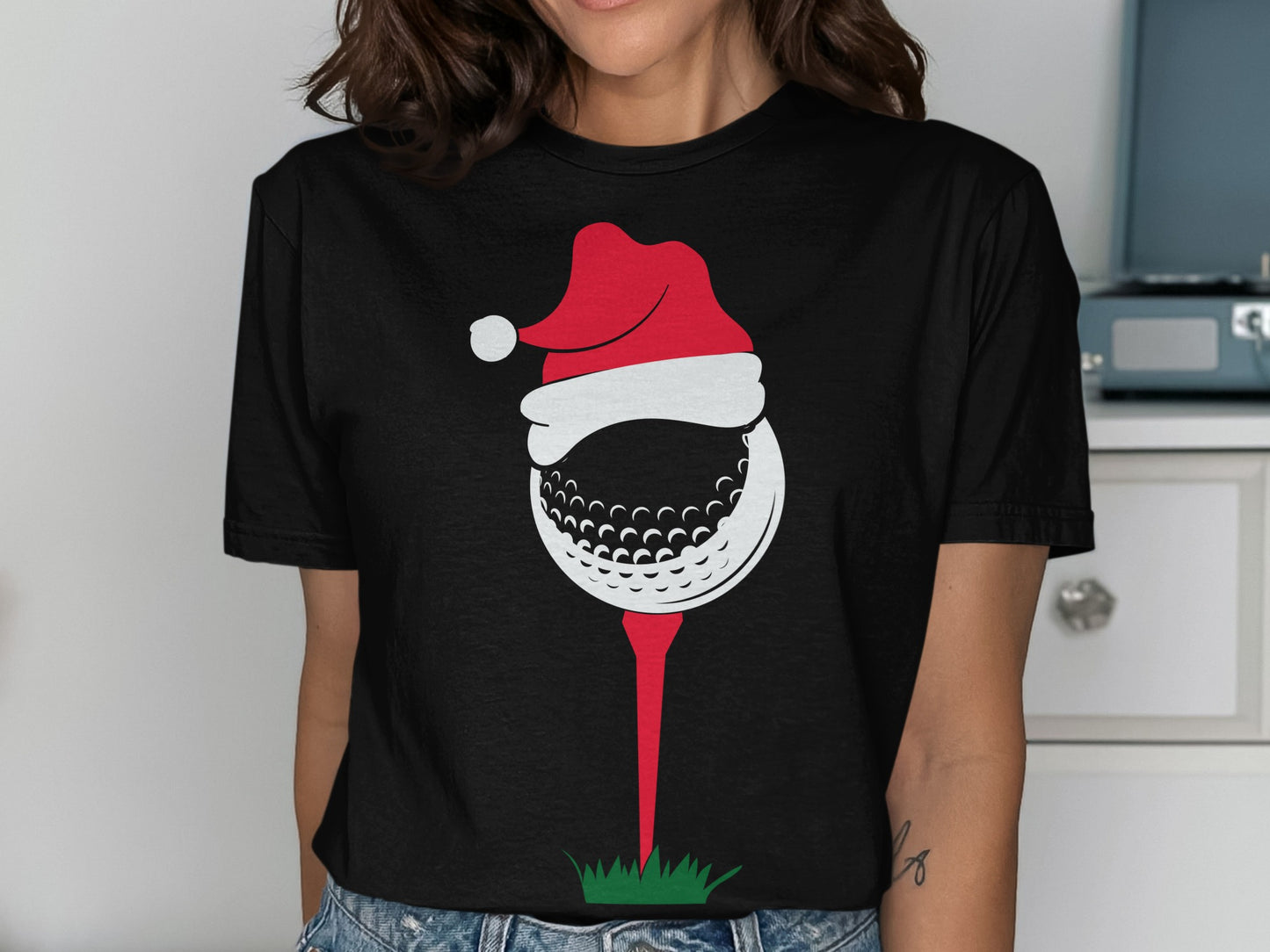 Black t-shirt with a Christmas golf ball on a tee design.