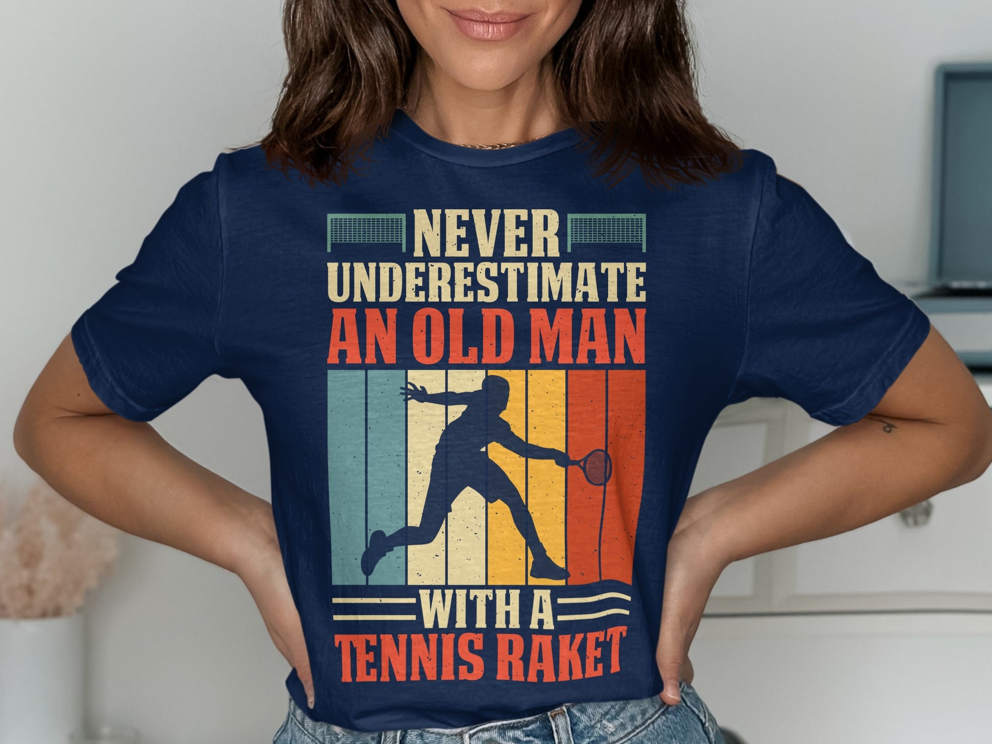 Navy t-shirt with vintage style text and tennis player graphic.