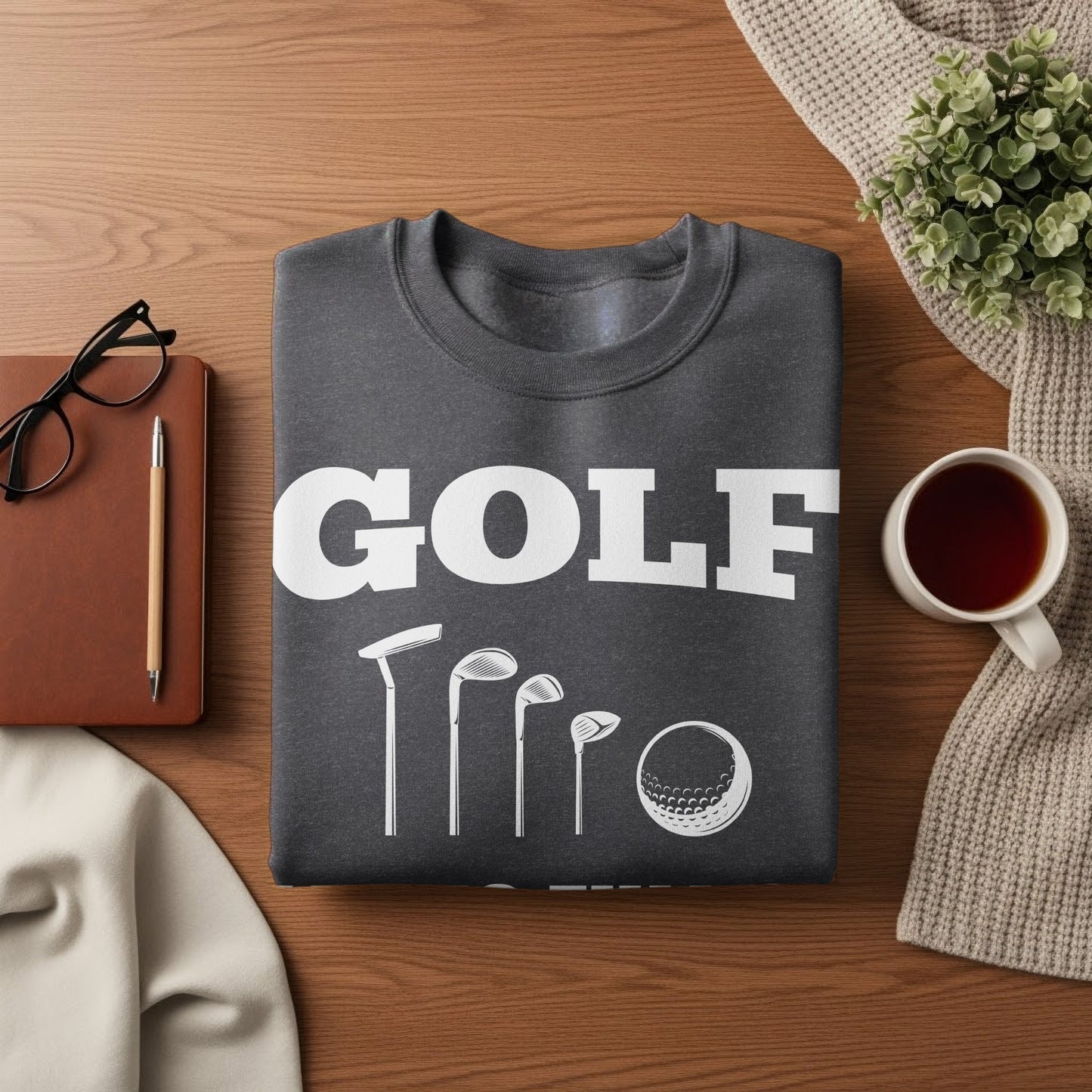 Dark gray sweatshirt with "GOLF" and golf club and ball graphics.