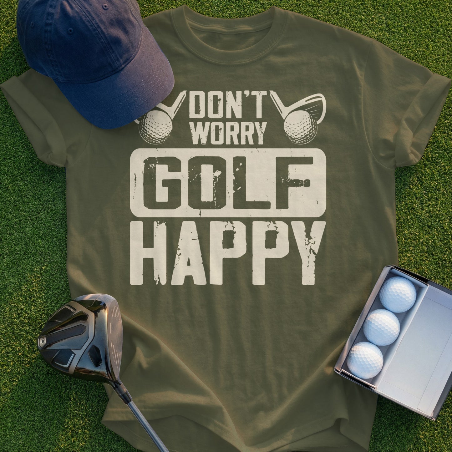 Green t-shirt with "Don't Worry Golf Happy" text, golf balls, and clubs.