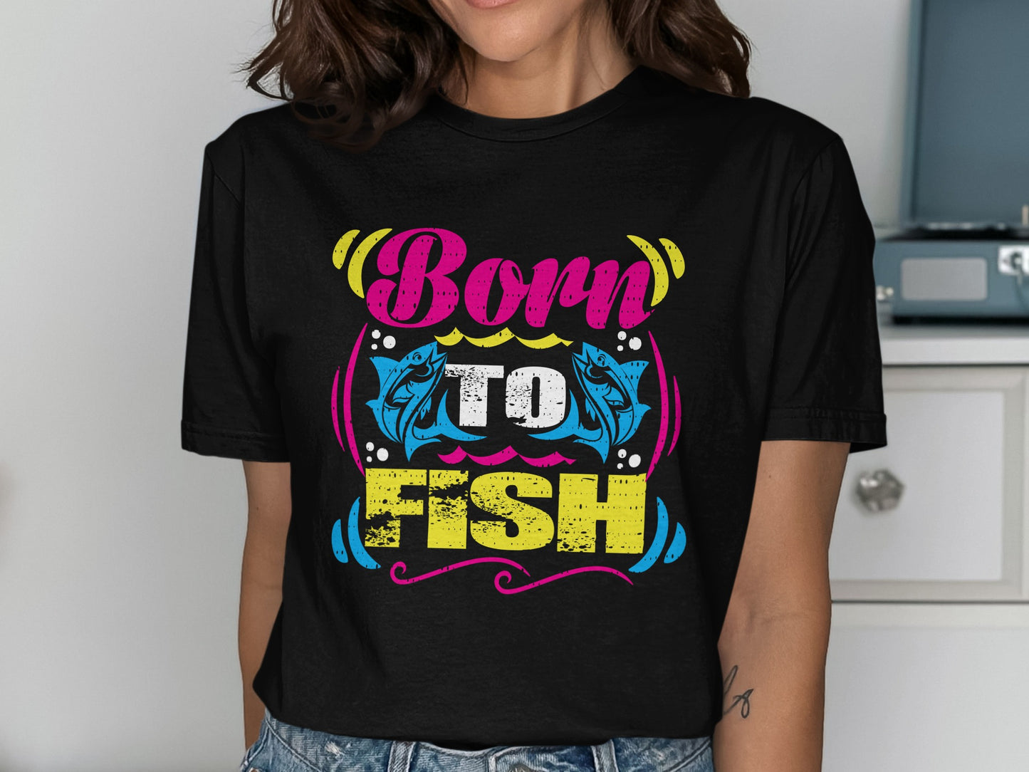 Black t-shirt with "Born to Fish" text and leaping fish graphic.