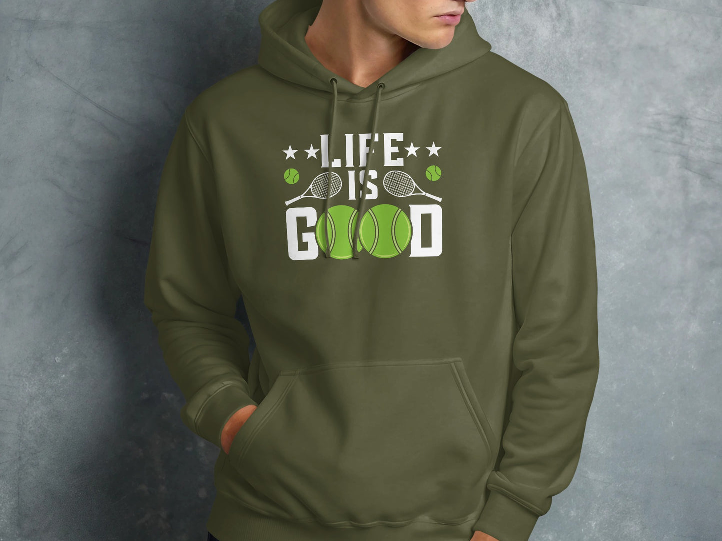 Green hoodie with "LIFE IS GOOD" text, tennis rackets, and tennis balls.