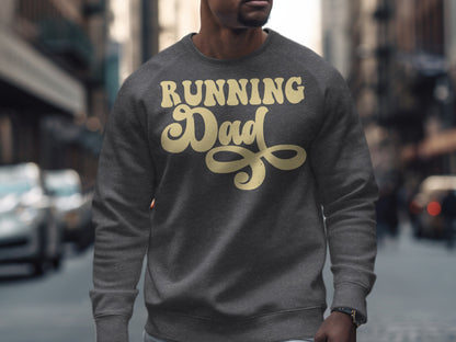 Man wearing a dark gray sweatshirt with "Running Dad" in yellow script.