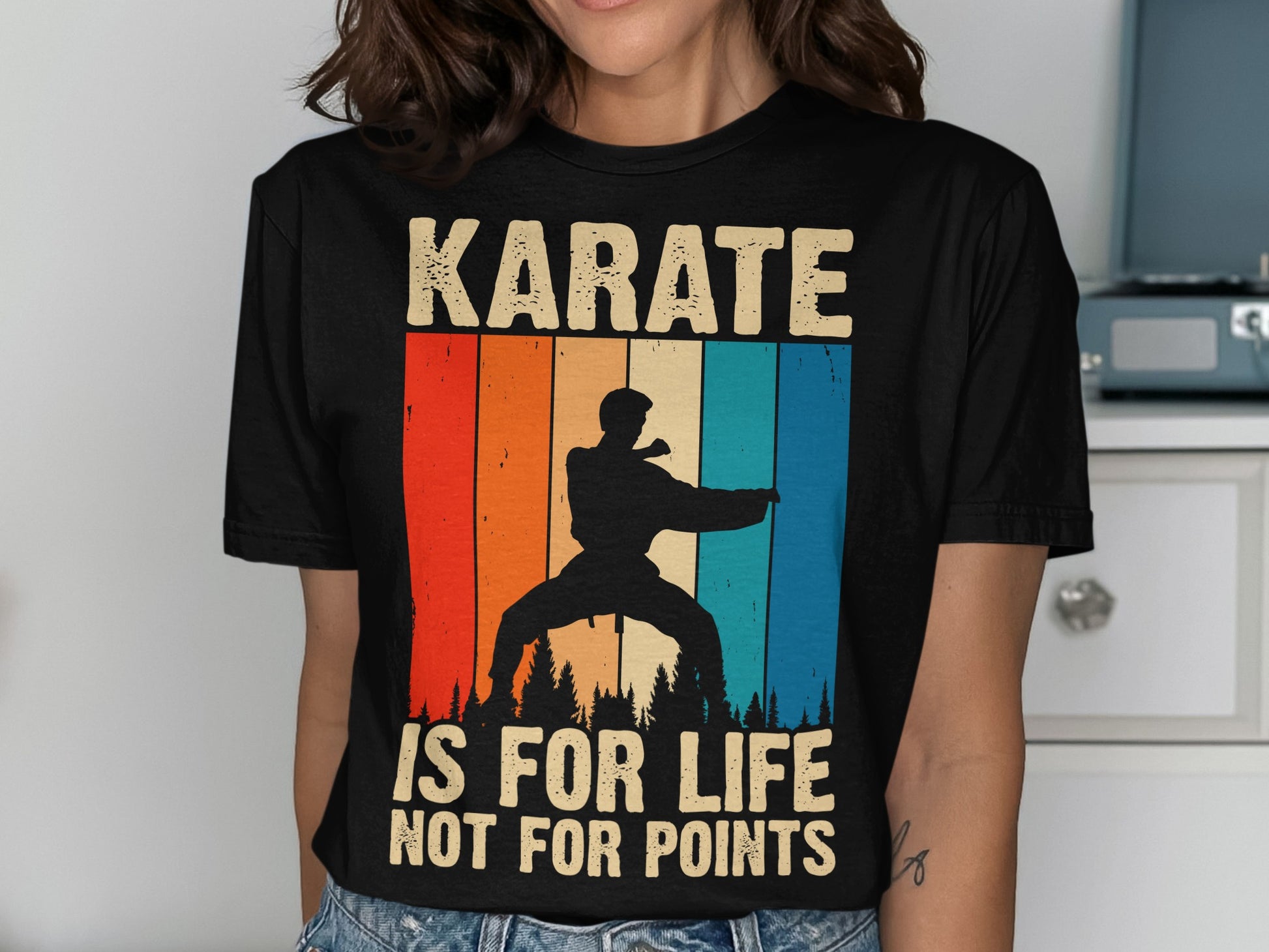 Black t-shirt with a karate silhouette and "Karate is for life not for points" text.