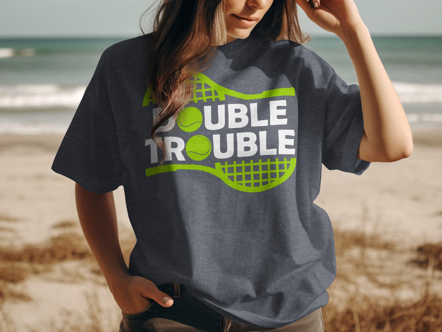 Dark gray t-shirt with "Double Trouble" text and tennis graphic.