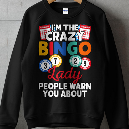 Black sweatshirt with "I'm the crazy bingo lady people warn you about" text.