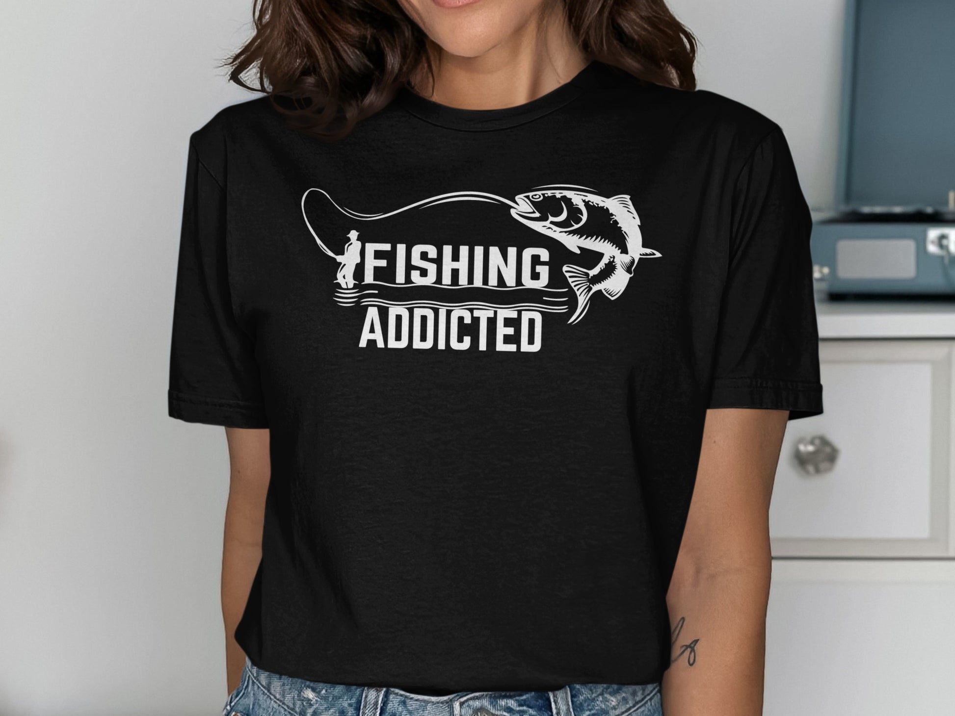 Black t-shirt with "FISHING ADDICTED" text and a leaping fish graphic.