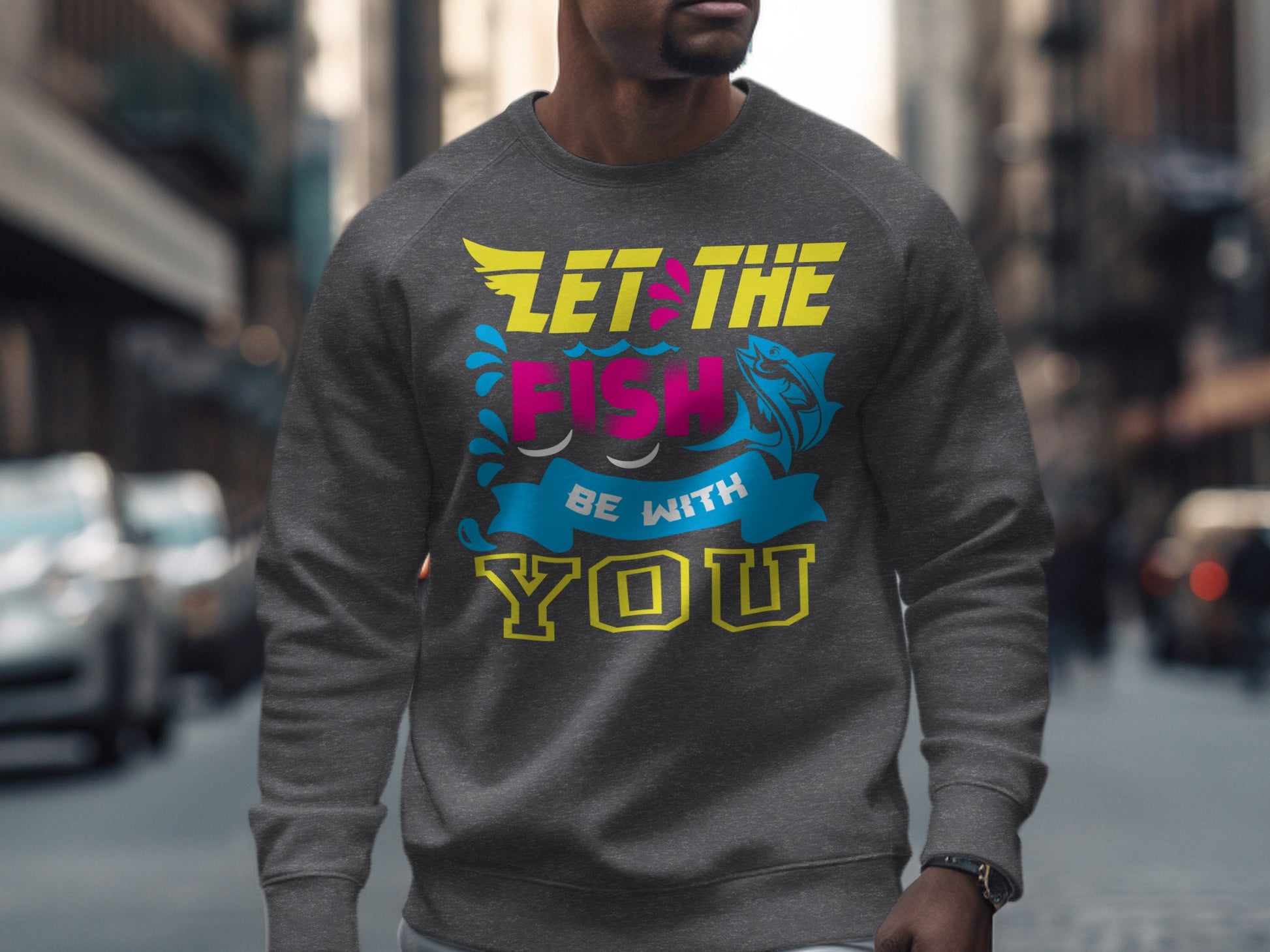 Gray sweatshirt with "Let the Fish Be With You" text and fish graphic.