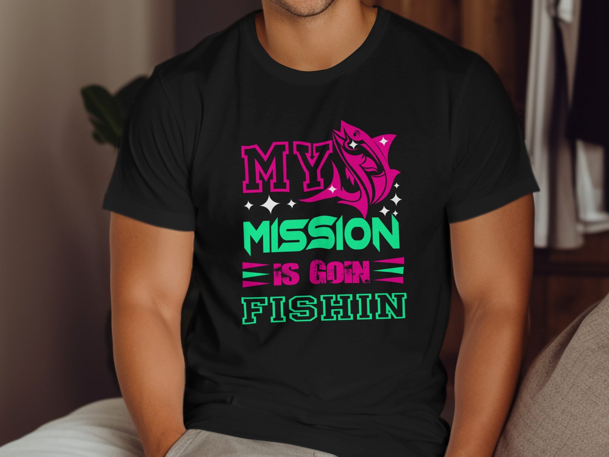 Black t-shirt with "MY MISSION IS GOIN FISHIN" text and fish graphic.