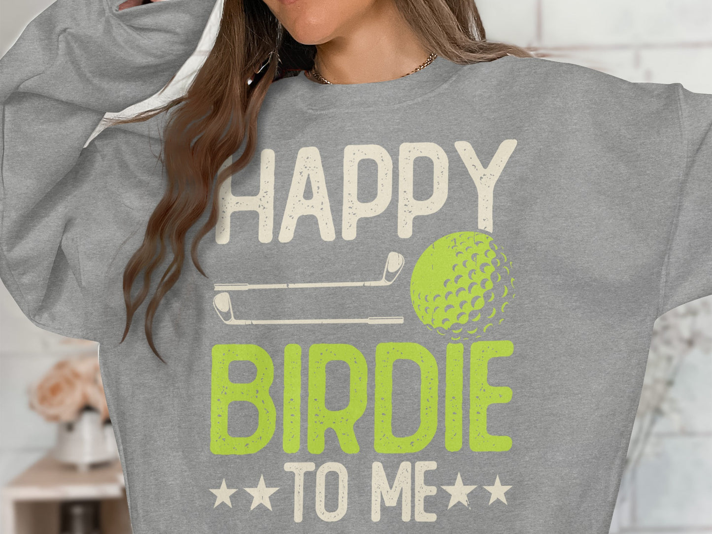 Gray sweatshirt with "HAPPY BIRDIE TO ME" text and golf club graphics.