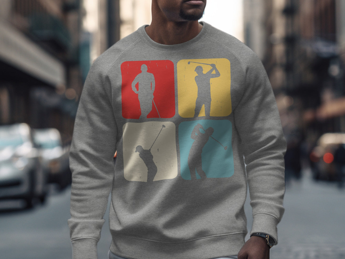 Gray sweatshirt with four colorful golfer silhouettes in squares.