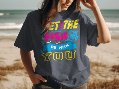 Dark t-shirt with "Let the fish be with you" text and fish graphic.