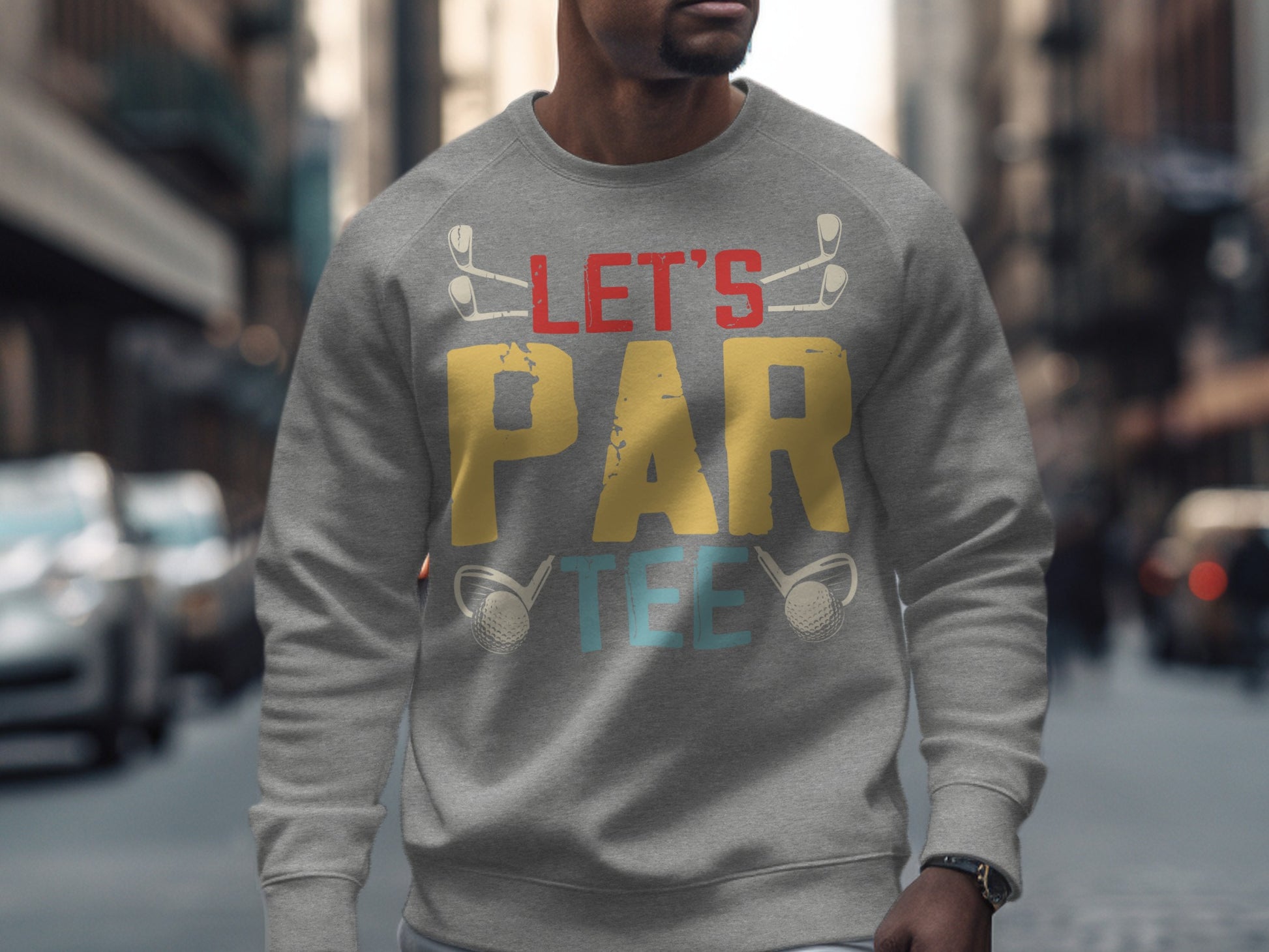 Grey sweatshirt with "LET'S PAR TEE" text and golf club graphics.