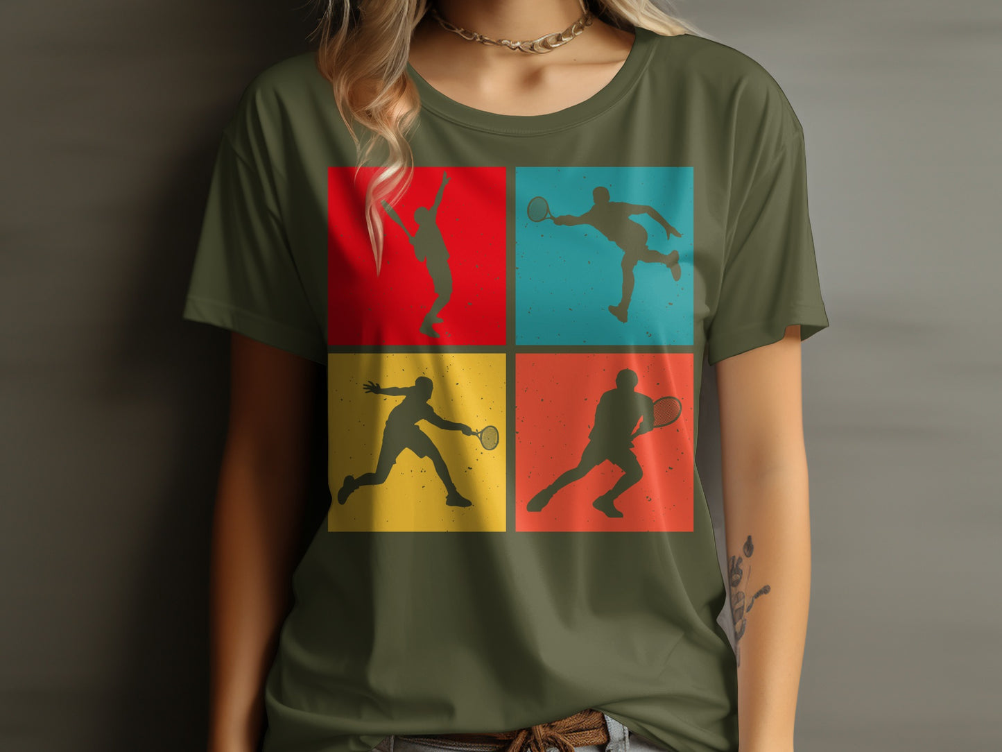 Four tennis player silhouettes in colorful squares on a green t-shirt.