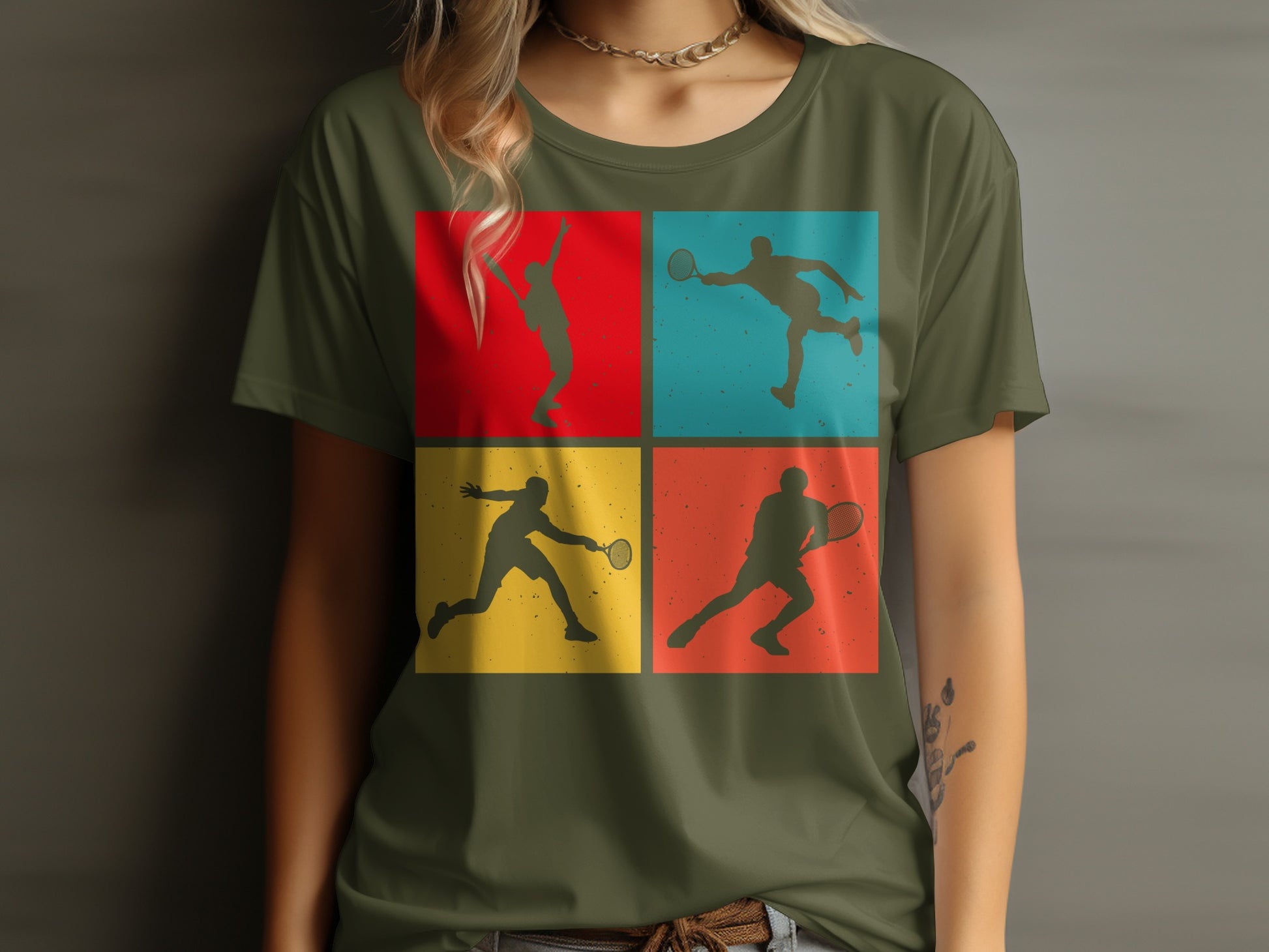 Four tennis player silhouettes in colorful squares on a green t-shirt.