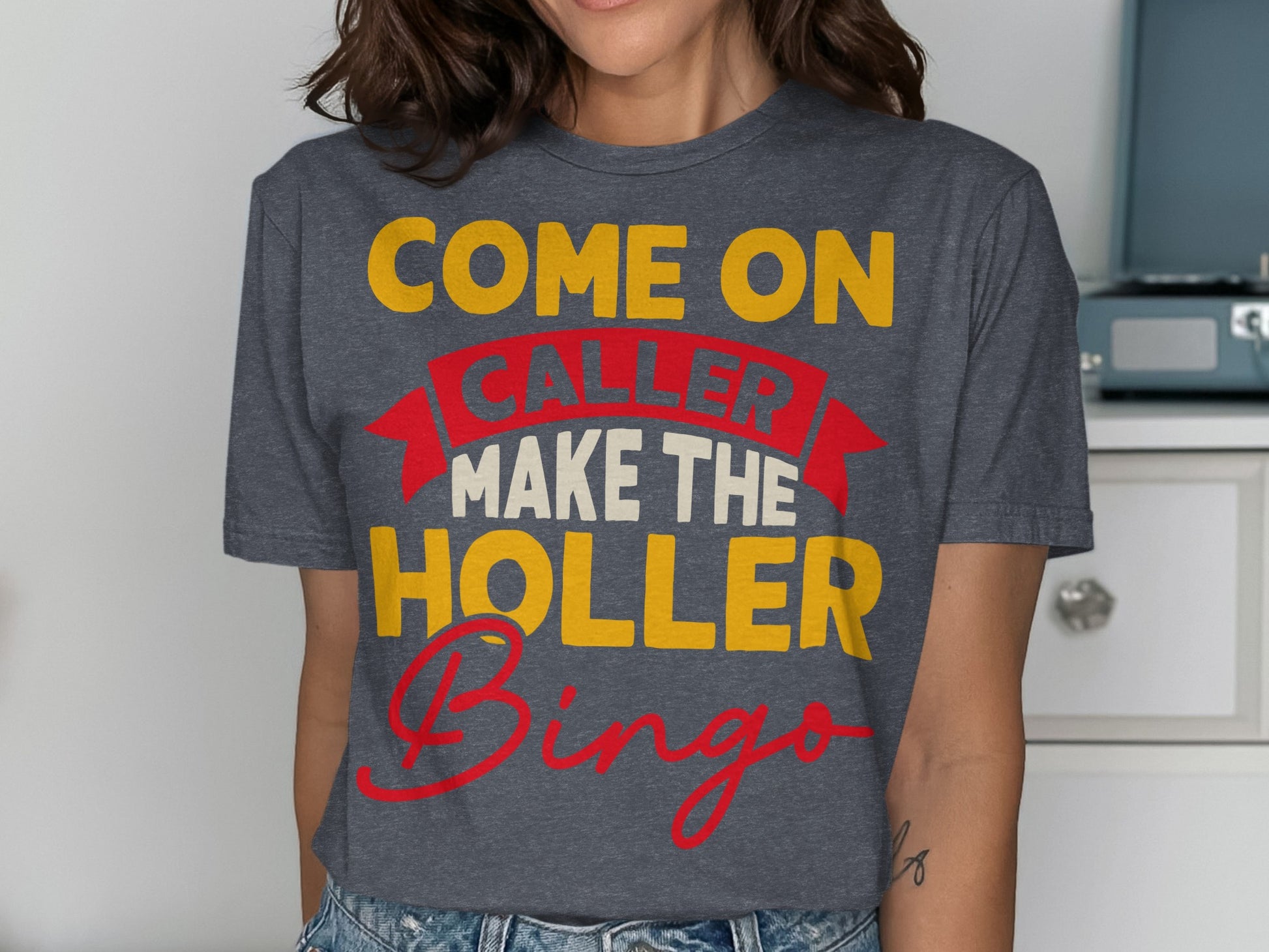 T-shirt with text "Come on caller, make the holler bingo".