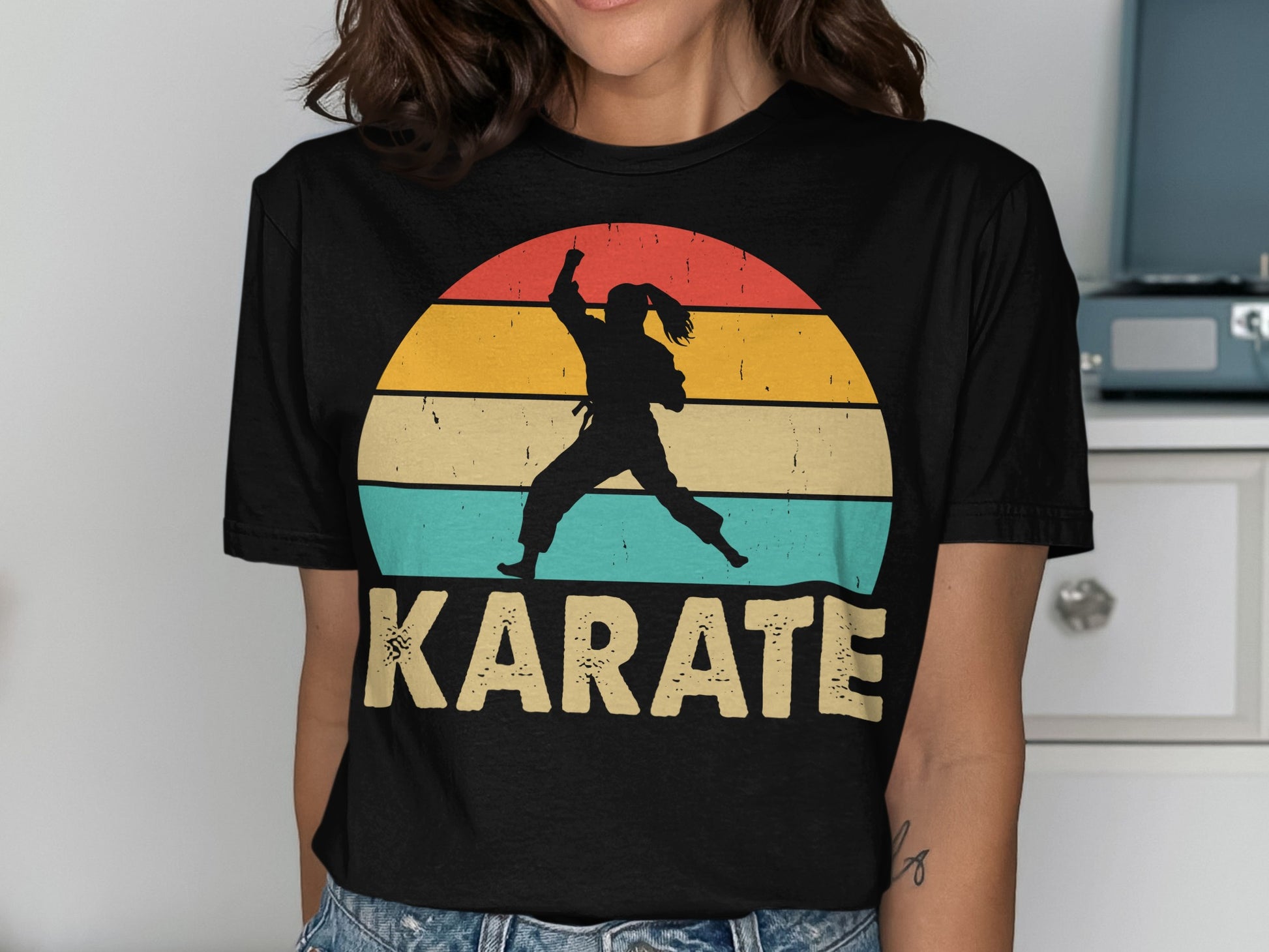 Black t-shirt with "KARATE" text and silhouette of a person practicing martial arts.