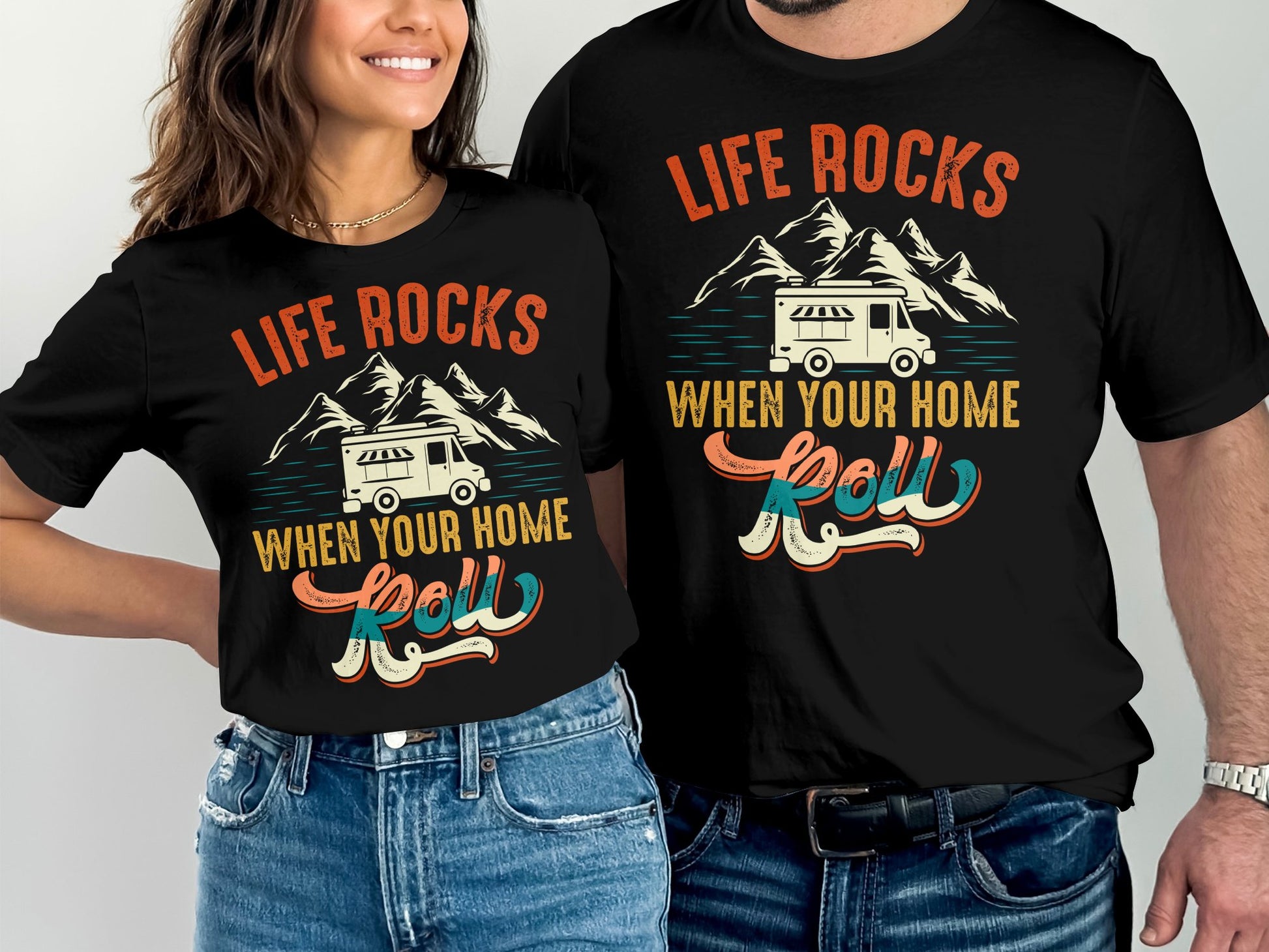 Black t-shirts with "Life Rocks When Your Home Roll" camper graphic.