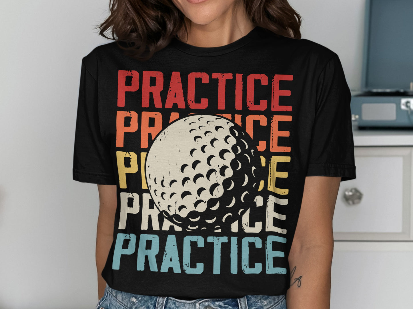 Black t-shirt with repeating "PRACTICE" text and a golf ball graphic.
