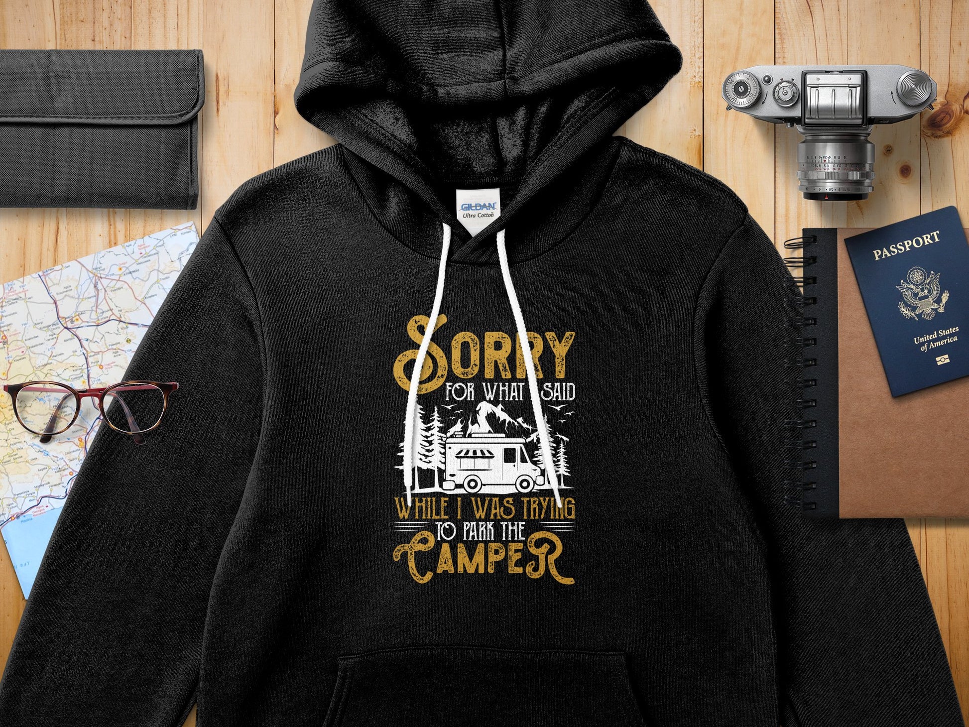 Black hoodie with "Sorry for what I said while I was trying to park the camper" text.