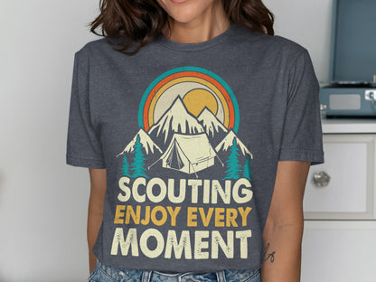 T-shirt with mountains, tent, sun, and "Scouting Enjoy Every Moment" text.