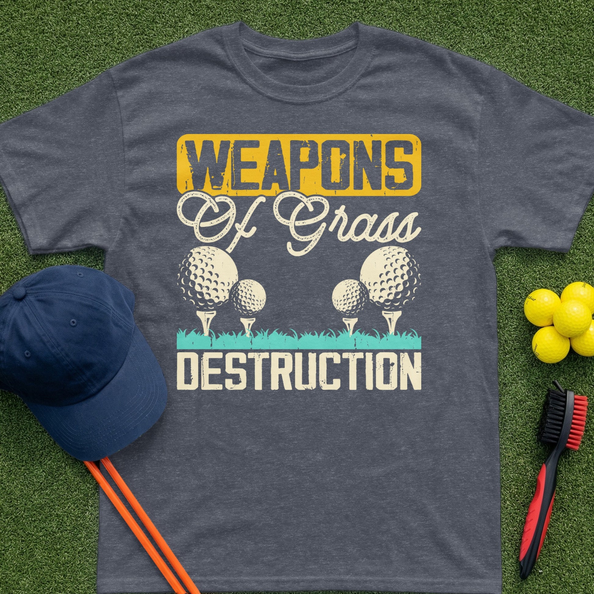 T-shirt with "Weapons of Grass Destruction" and golf balls.