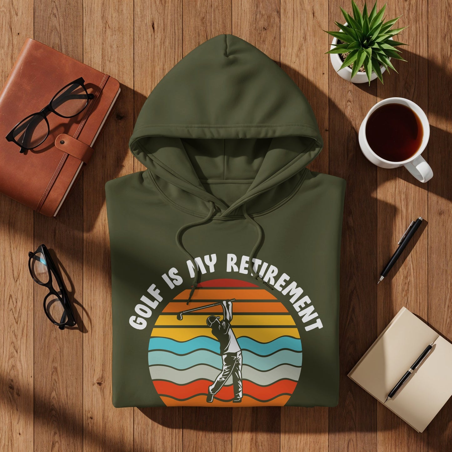 Green hoodie with golfer silhouette and "Golf Is My Retirement" text.