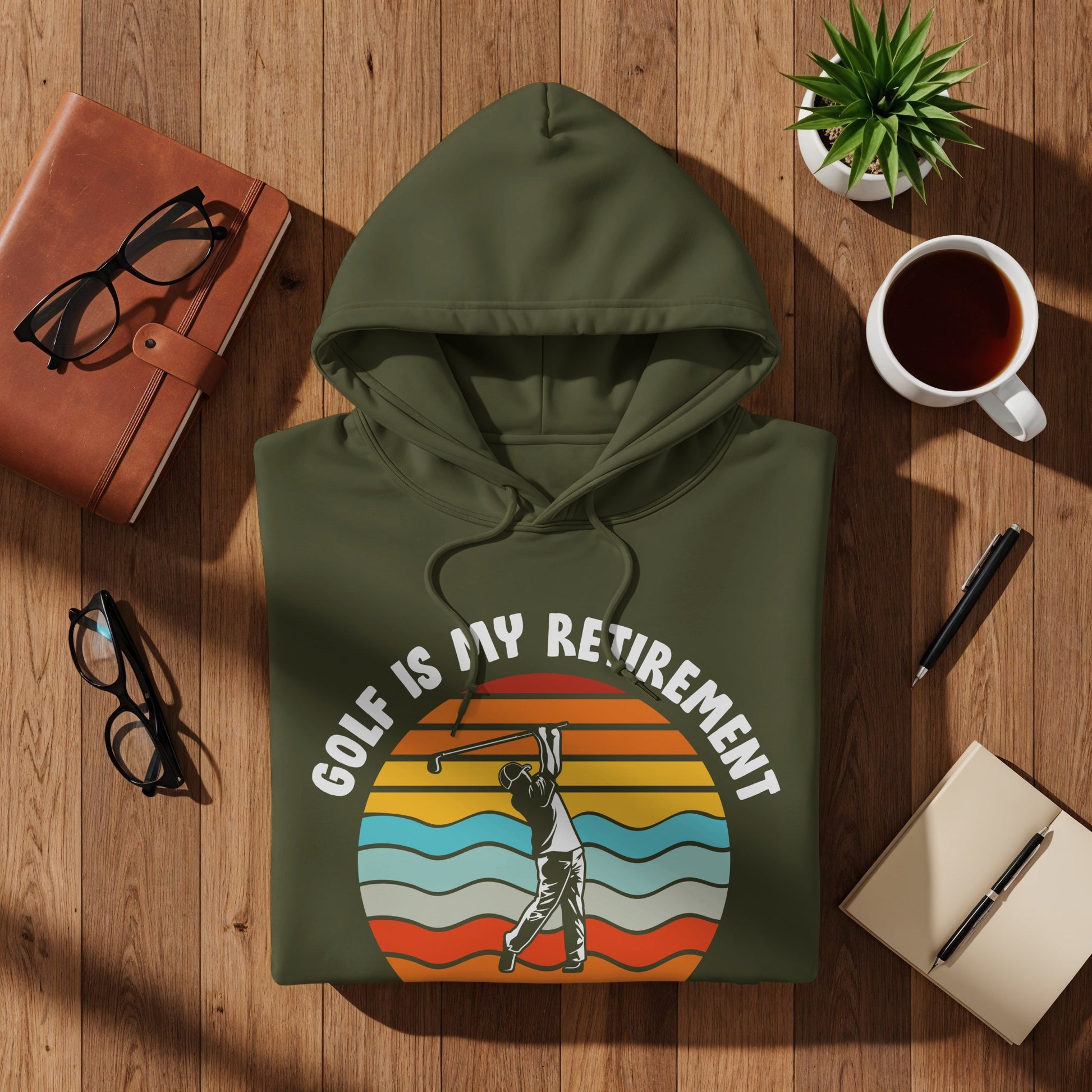 Green hoodie with golfer silhouette and "Golf Is My Retirement" text.