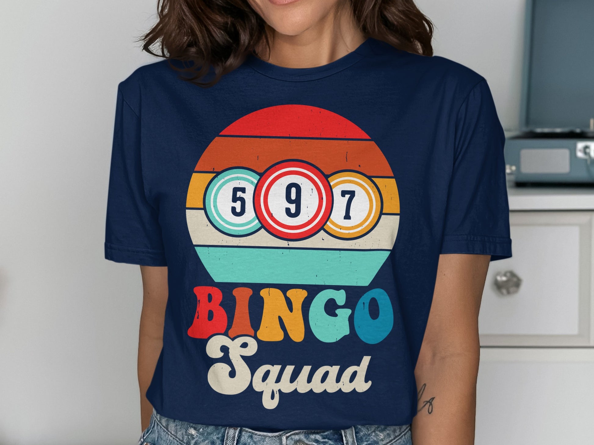 Navy t-shirt with "Bingo Squad" and bingo balls design.