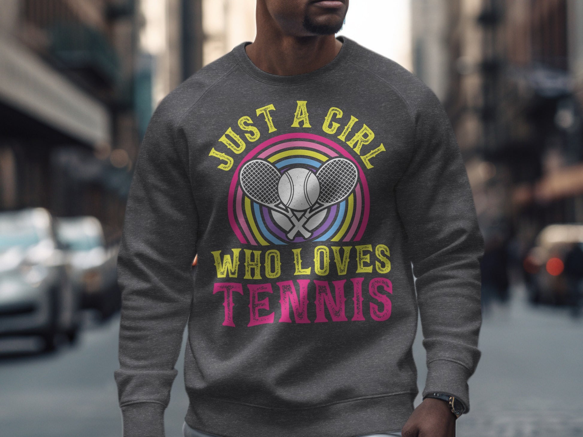 Gray sweatshirt with "Just a girl who loves tennis" and tennis rackets.