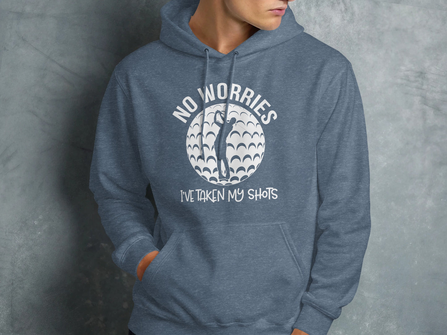 Blue hoodie with "NO WORRIES I'VE TAKEN MY SHOTS" text and golf ball graphic.