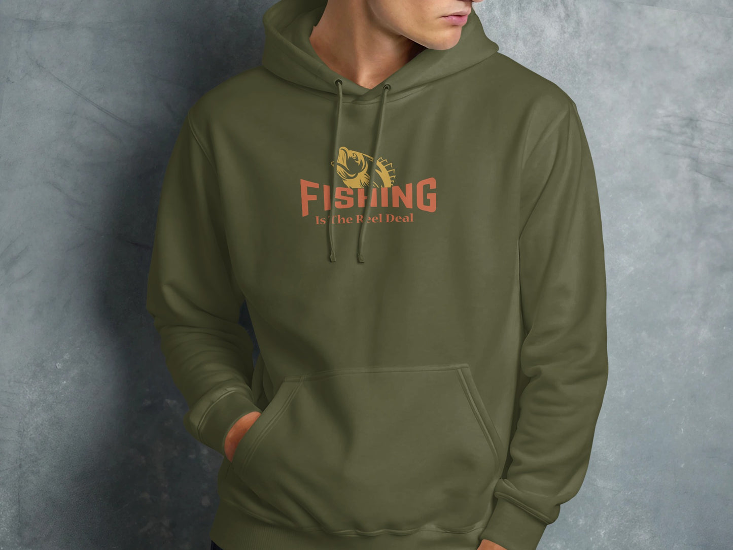 Olive green hoodie with "FISHING Is the Reel Deal" text and fish graphic.