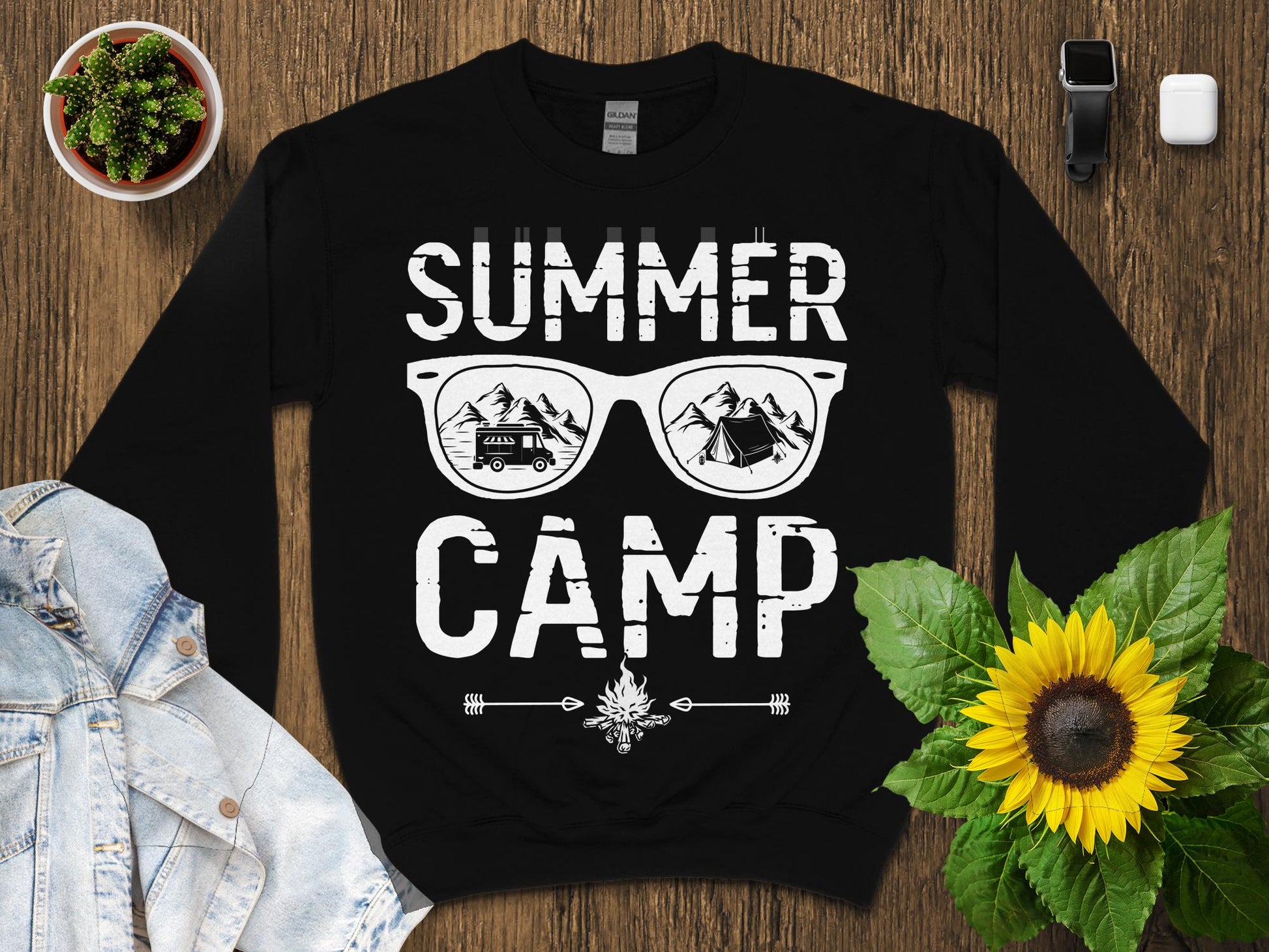 Black sweatshirt with "SUMMER CAMP" text and sunglasses graphic.