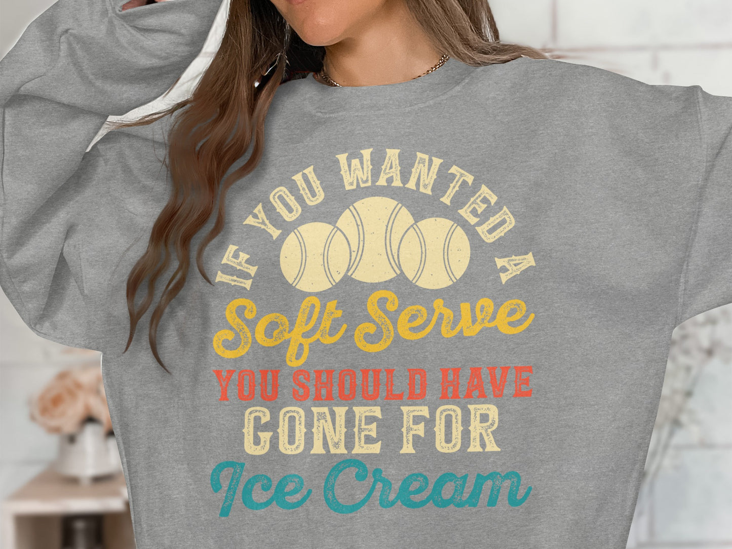 Grey sweatshirt with "If you wanted a soft serve, you should have gone for ice cream" text.