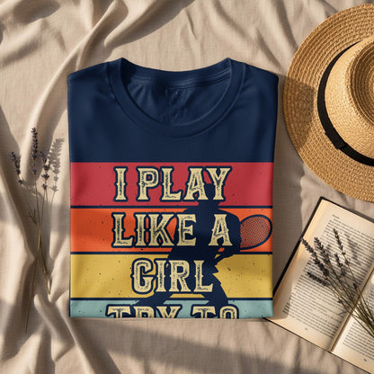 Navy t-shirt with "I Play Like A Girl" text and tennis player graphic.