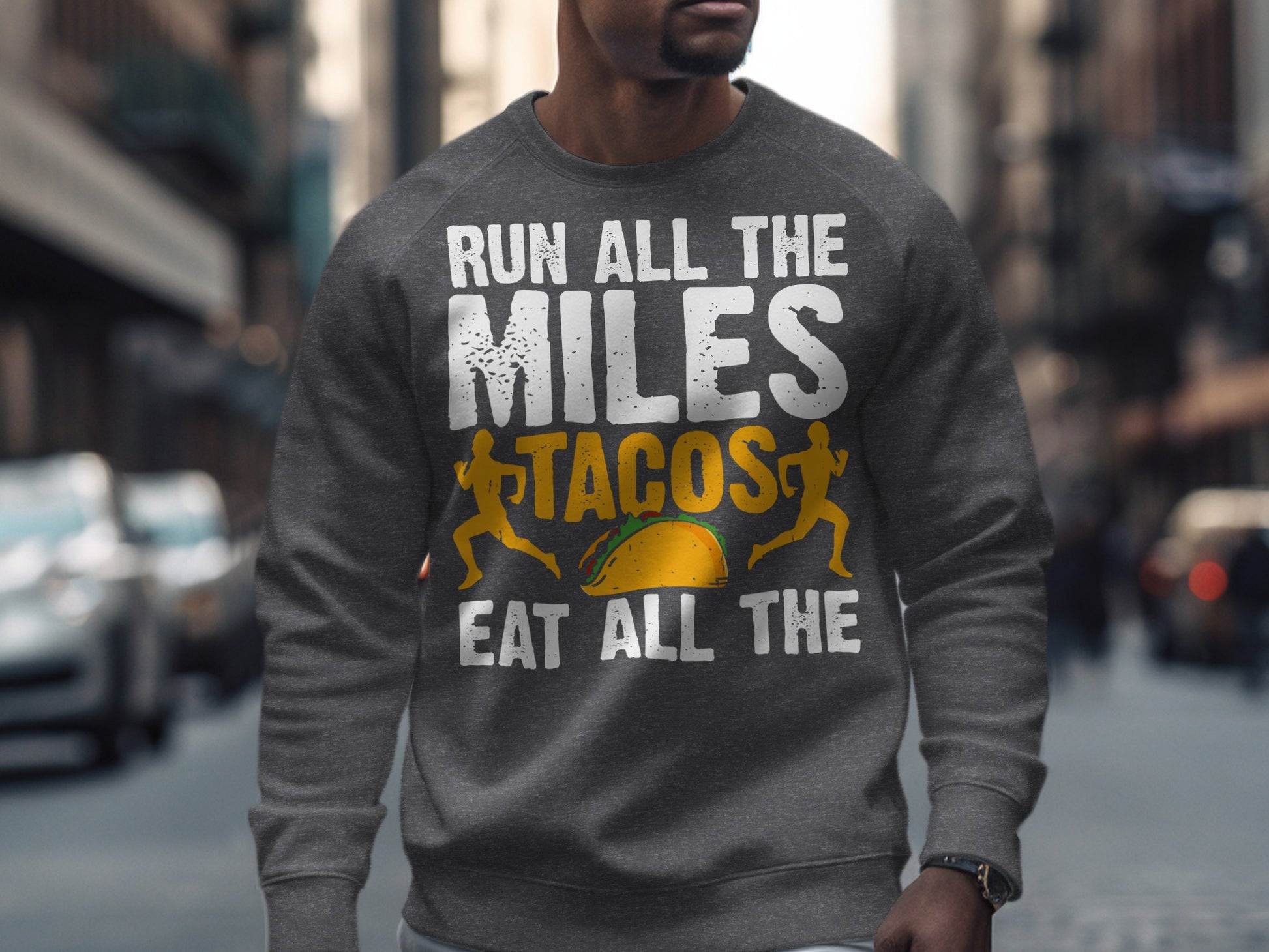 Grey sweatshirt with "Run all the miles eat all the tacos" text and taco graphic.