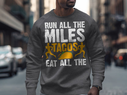 Grey sweatshirt with "Run all the miles eat all the tacos" text and taco graphic.
