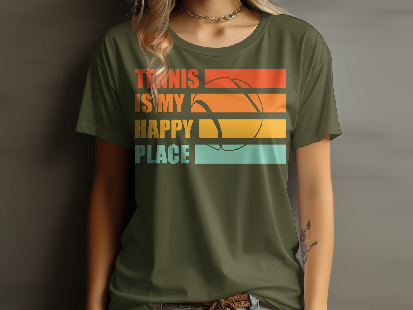 T-shirt with "Tennis is my happy place" text and a colorful tennis ball graphic.